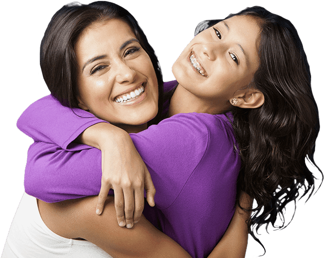 Smiling mother and daughter hugging