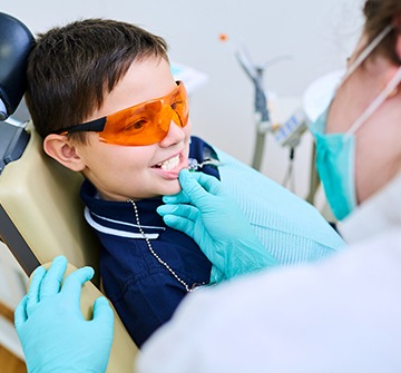 Young boy receiving dental exam