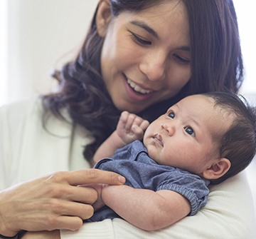 Mother holding infant