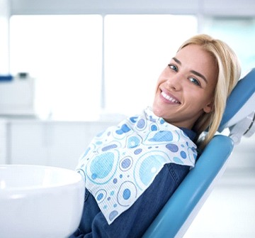A woman visiting an orthodontist in Fitchburg.