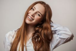 Smiling teenager with braces 