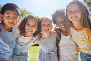 a group of kids playing outside