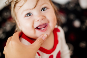 a young child smiling